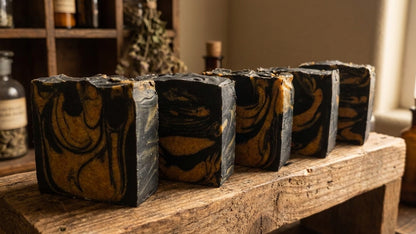 The Golden Obsidian - Turmeric, Activated Charcoal - Tea Tree, Lemongrass, and Cedarwood Essential Oil.