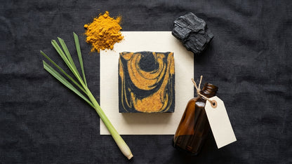 The Golden Obsidian - Turmeric, Activated Charcoal - Tea Tree, Lemongrass, and Cedarwood Essential Oil.