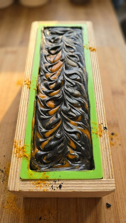 The Golden Obsidian - Turmeric, Activated Charcoal - Tea Tree, Lemongrass, and Cedarwood Essential Oil.
